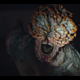 A clicker--an infected human whose face is mostly overgrown with fungal growth--screams at the camera in a moment from HBO's The Last of Us.